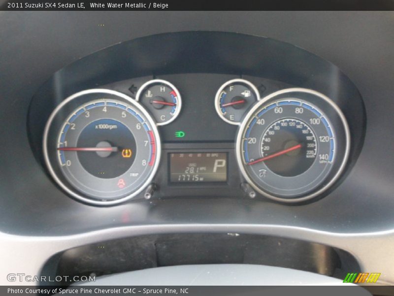 White Water Metallic / Beige 2011 Suzuki SX4 Sedan LE