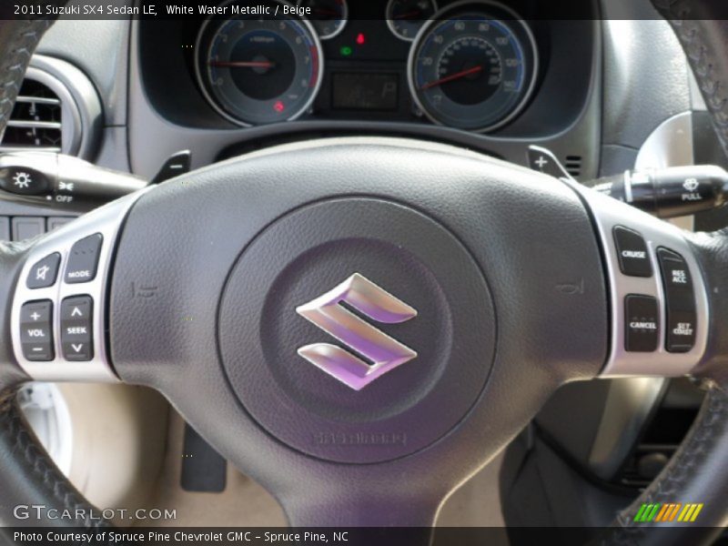 White Water Metallic / Beige 2011 Suzuki SX4 Sedan LE