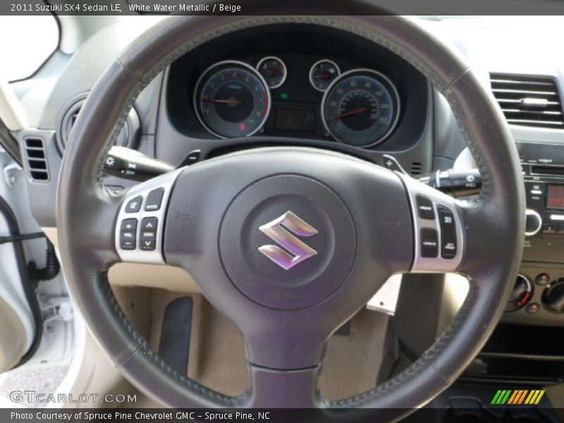 White Water Metallic / Beige 2011 Suzuki SX4 Sedan LE