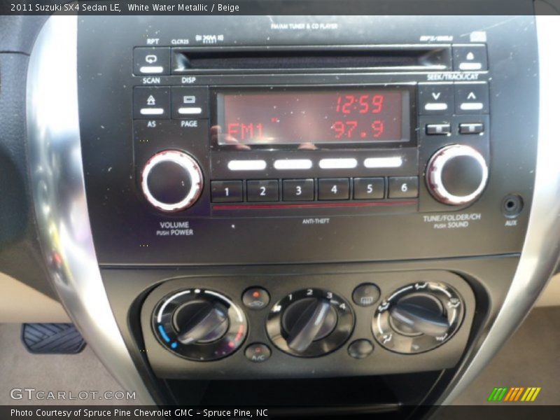 White Water Metallic / Beige 2011 Suzuki SX4 Sedan LE