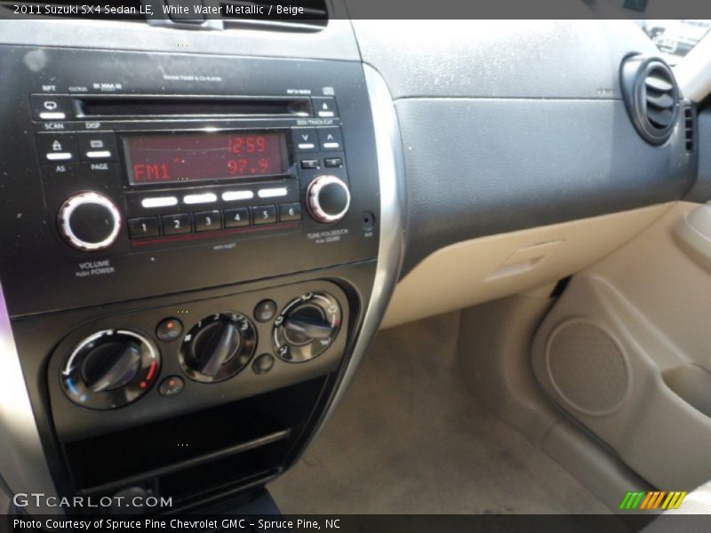 White Water Metallic / Beige 2011 Suzuki SX4 Sedan LE