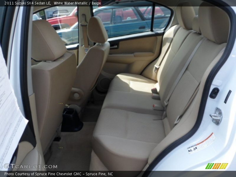 White Water Metallic / Beige 2011 Suzuki SX4 Sedan LE