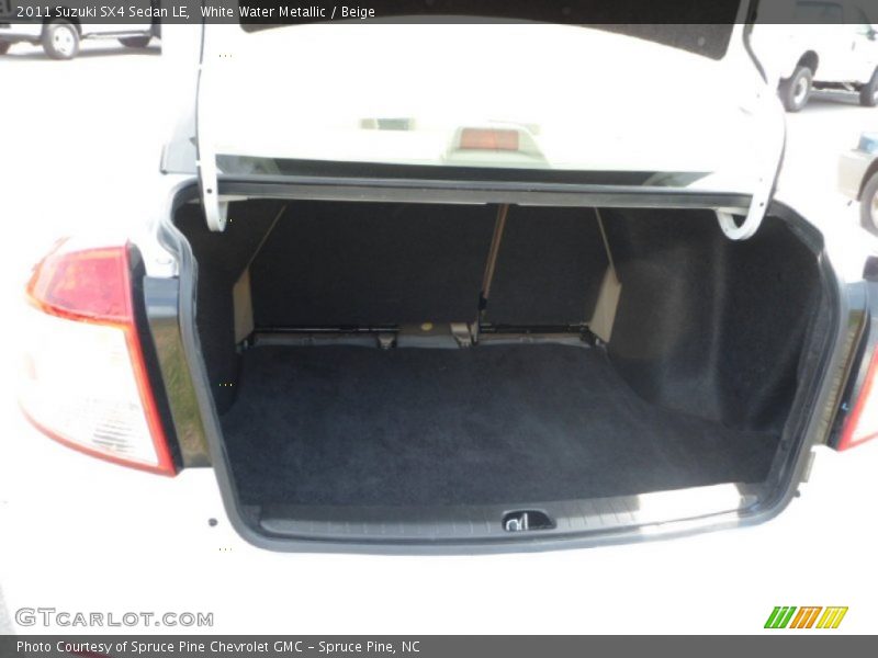 White Water Metallic / Beige 2011 Suzuki SX4 Sedan LE