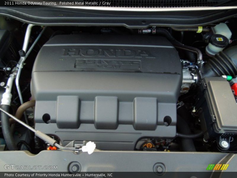 Polished Metal Metallic / Gray 2011 Honda Odyssey Touring