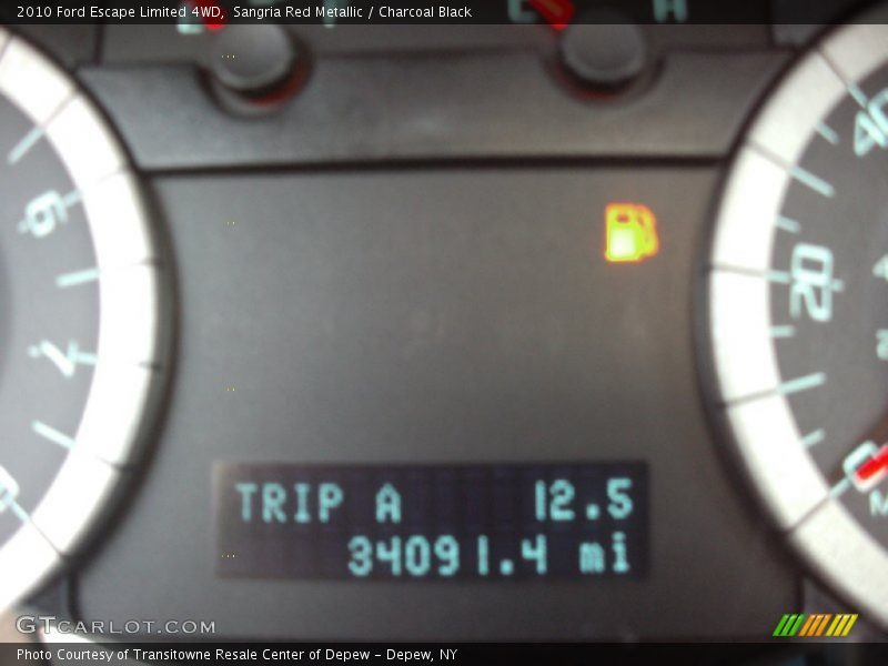 Sangria Red Metallic / Charcoal Black 2010 Ford Escape Limited 4WD