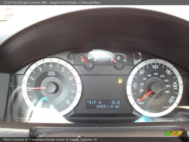 Sangria Red Metallic / Charcoal Black 2010 Ford Escape Limited 4WD