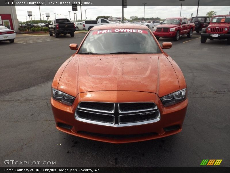 Toxic Orange Pearl / Black 2011 Dodge Charger SE