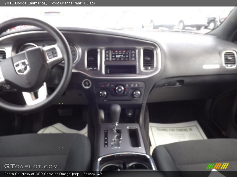 Toxic Orange Pearl / Black 2011 Dodge Charger SE