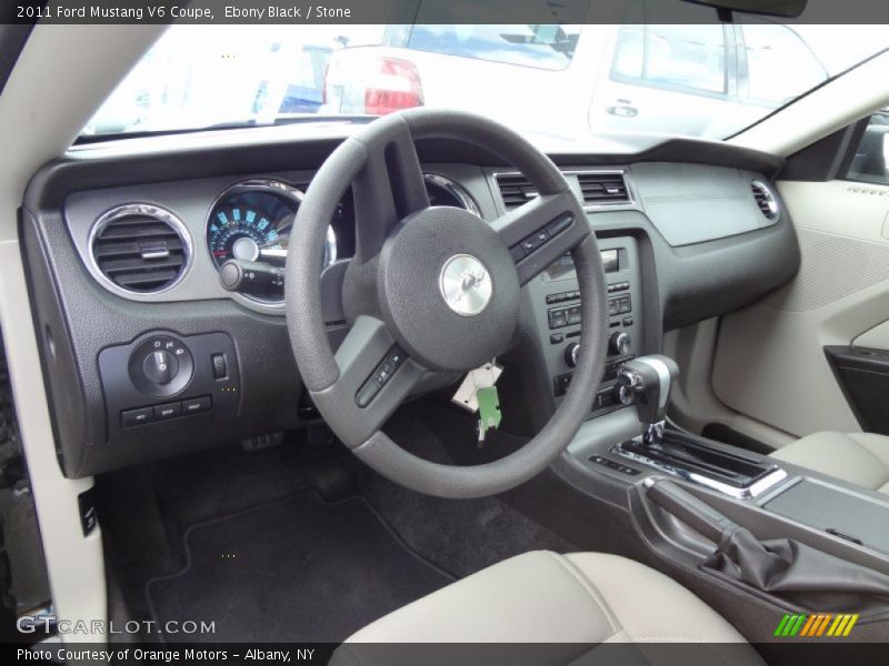 Ebony Black / Stone 2011 Ford Mustang V6 Coupe