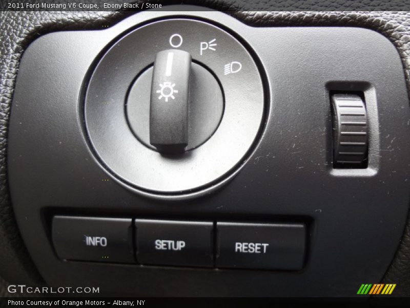 Ebony Black / Stone 2011 Ford Mustang V6 Coupe