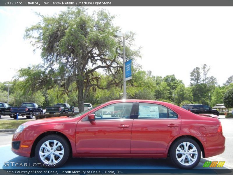 Red Candy Metallic / Medium Light Stone 2012 Ford Fusion SE