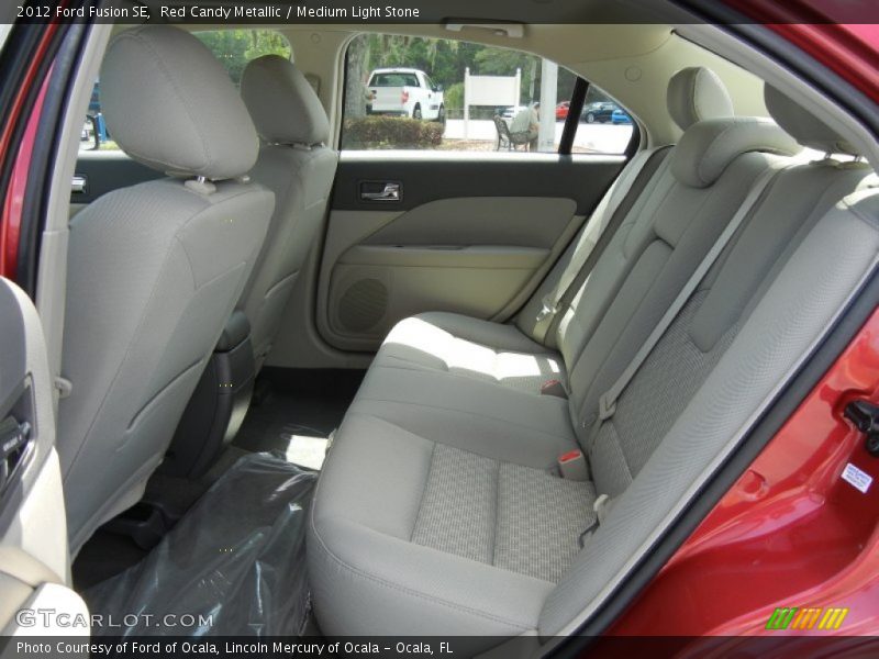 Red Candy Metallic / Medium Light Stone 2012 Ford Fusion SE