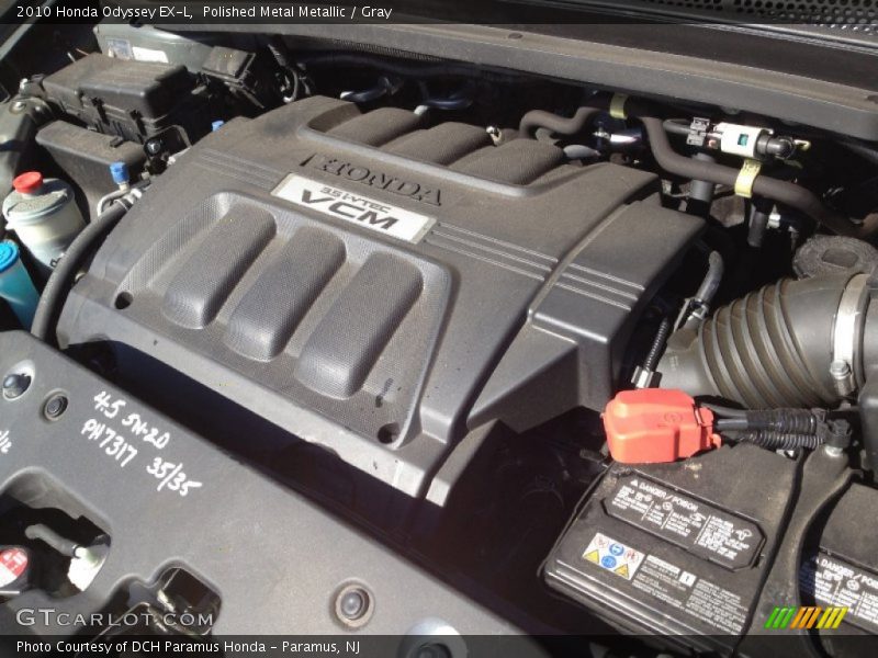 Polished Metal Metallic / Gray 2010 Honda Odyssey EX-L