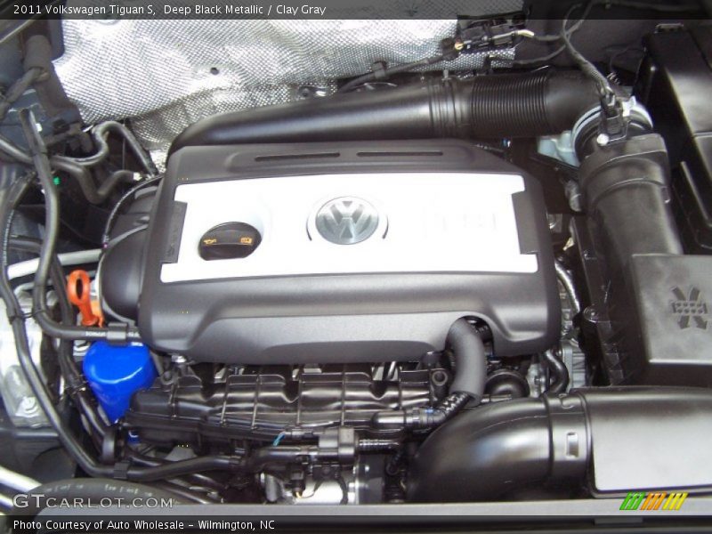 Deep Black Metallic / Clay Gray 2011 Volkswagen Tiguan S