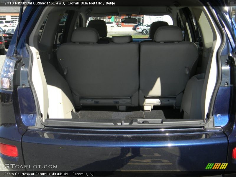 Cosmic Blue Metallic / Beige 2010 Mitsubishi Outlander SE 4WD