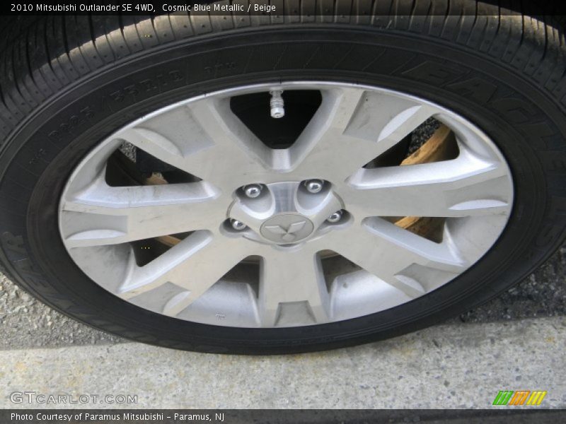 Cosmic Blue Metallic / Beige 2010 Mitsubishi Outlander SE 4WD
