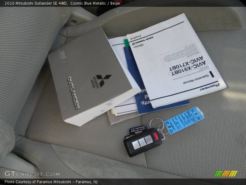 Cosmic Blue Metallic / Beige 2010 Mitsubishi Outlander SE 4WD