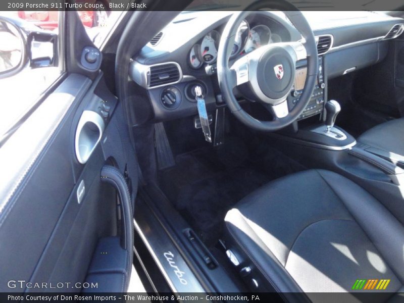 Black / Black 2009 Porsche 911 Turbo Coupe