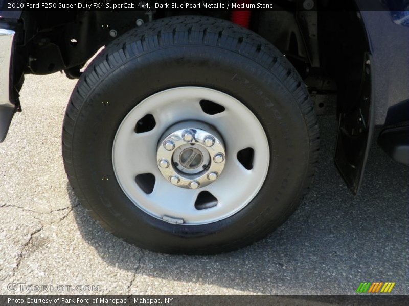 Dark Blue Pearl Metallic / Medium Stone 2010 Ford F250 Super Duty FX4 SuperCab 4x4