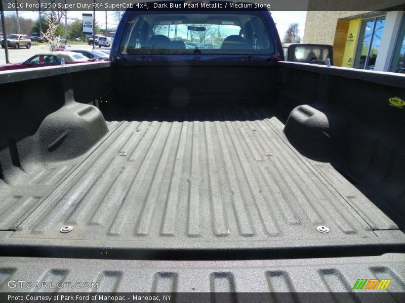 Dark Blue Pearl Metallic / Medium Stone 2010 Ford F250 Super Duty FX4 SuperCab 4x4
