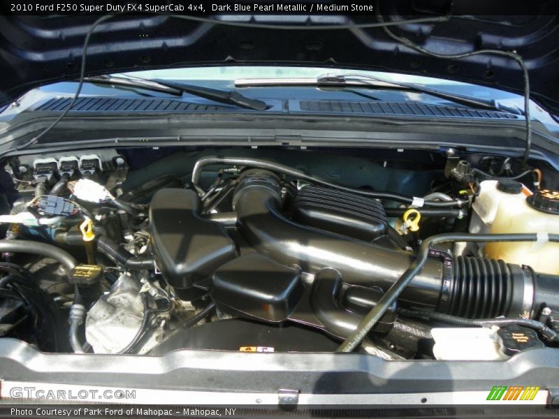 Dark Blue Pearl Metallic / Medium Stone 2010 Ford F250 Super Duty FX4 SuperCab 4x4
