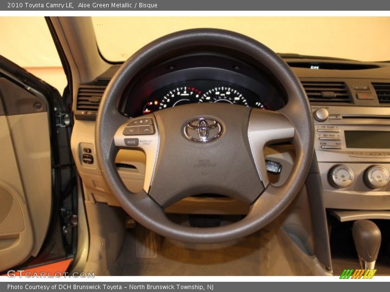 Aloe Green Metallic / Bisque 2010 Toyota Camry LE