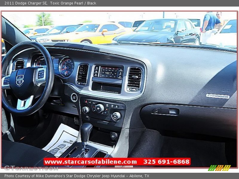 Toxic Orange Pearl / Black 2011 Dodge Charger SE