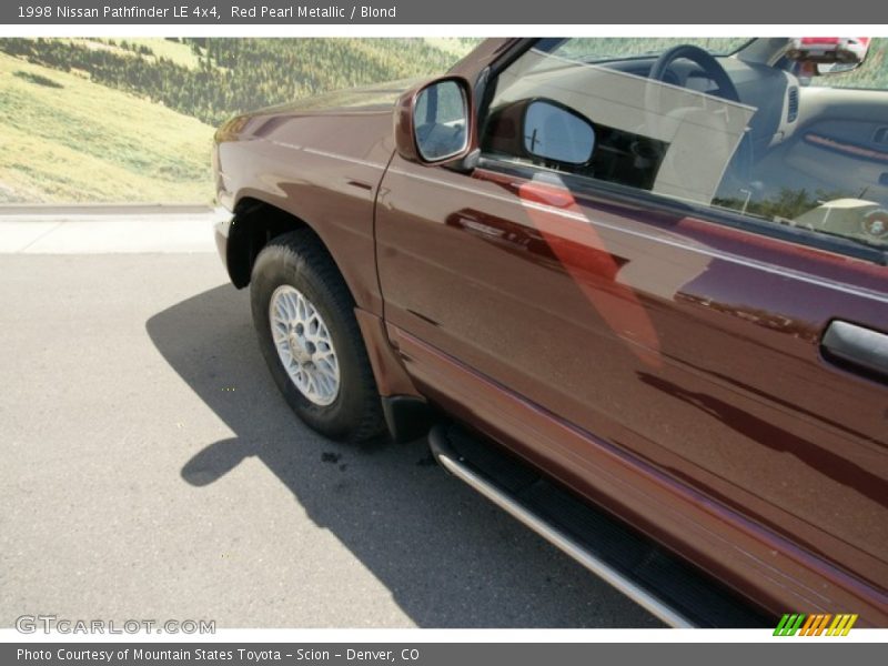 Red Pearl Metallic / Blond 1998 Nissan Pathfinder LE 4x4