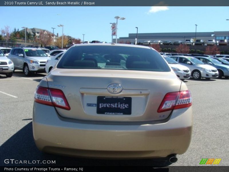 Sandy Beach Metallic / Bisque 2010 Toyota Camry LE