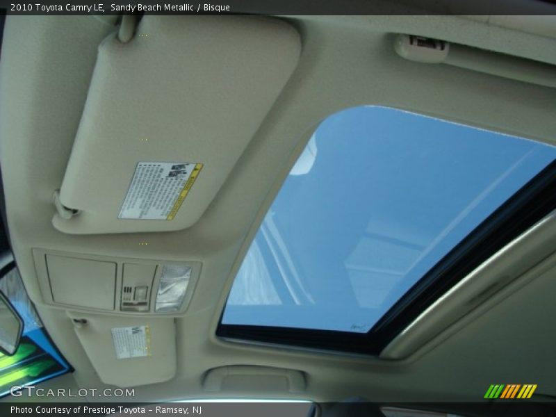 Sandy Beach Metallic / Bisque 2010 Toyota Camry LE