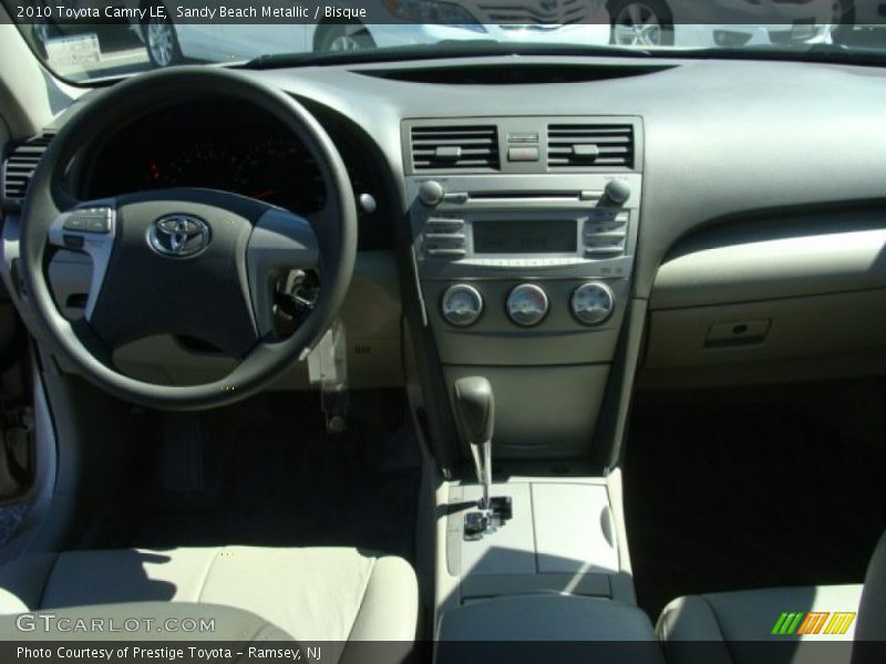 Sandy Beach Metallic / Bisque 2010 Toyota Camry LE