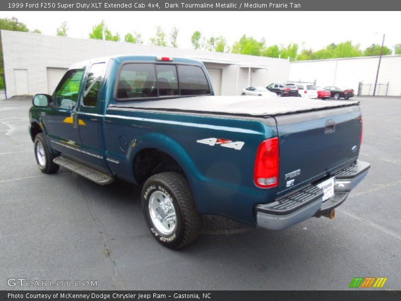 Dark Tourmaline Metallic / Medium Prairie Tan 1999 Ford F250 Super Duty XLT Extended Cab 4x4
