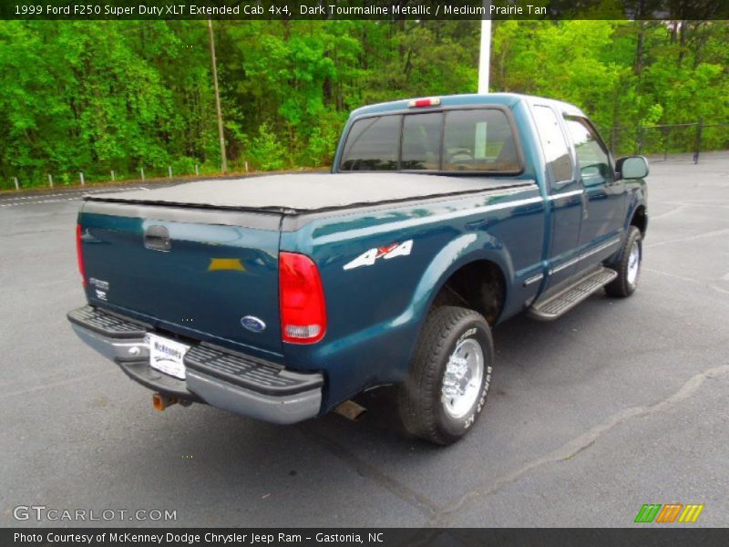 Dark Tourmaline Metallic / Medium Prairie Tan 1999 Ford F250 Super Duty XLT Extended Cab 4x4
