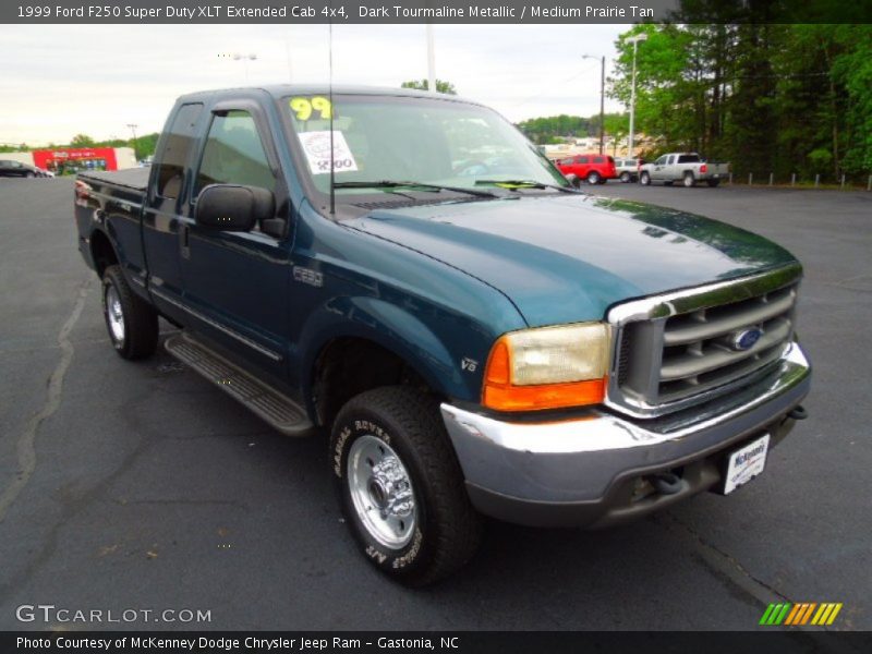 Dark Tourmaline Metallic / Medium Prairie Tan 1999 Ford F250 Super Duty XLT Extended Cab 4x4