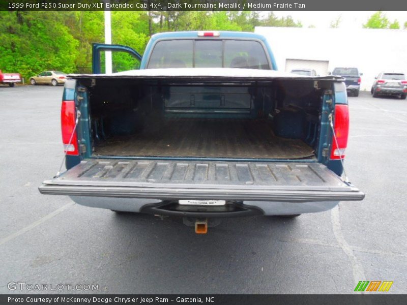 Dark Tourmaline Metallic / Medium Prairie Tan 1999 Ford F250 Super Duty XLT Extended Cab 4x4
