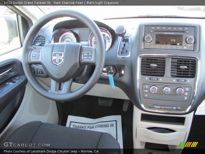 Dark Charcoal Pearl / Black/Light Graystone 2012 Dodge Grand Caravan SE