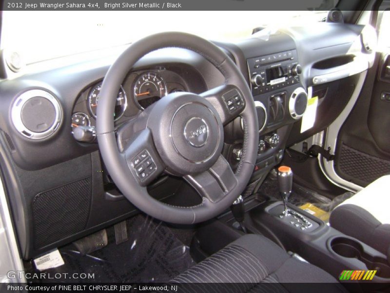 Bright Silver Metallic / Black 2012 Jeep Wrangler Sahara 4x4