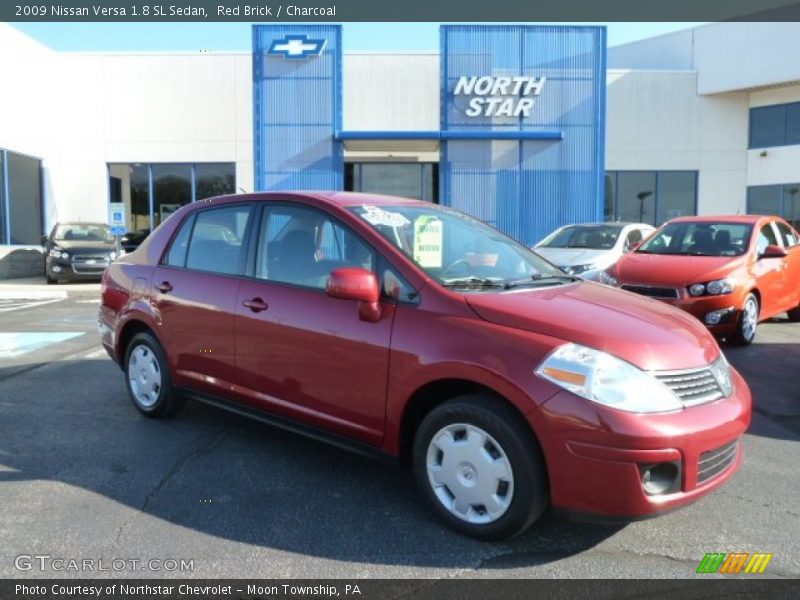 Red Brick / Charcoal 2009 Nissan Versa 1.8 SL Sedan