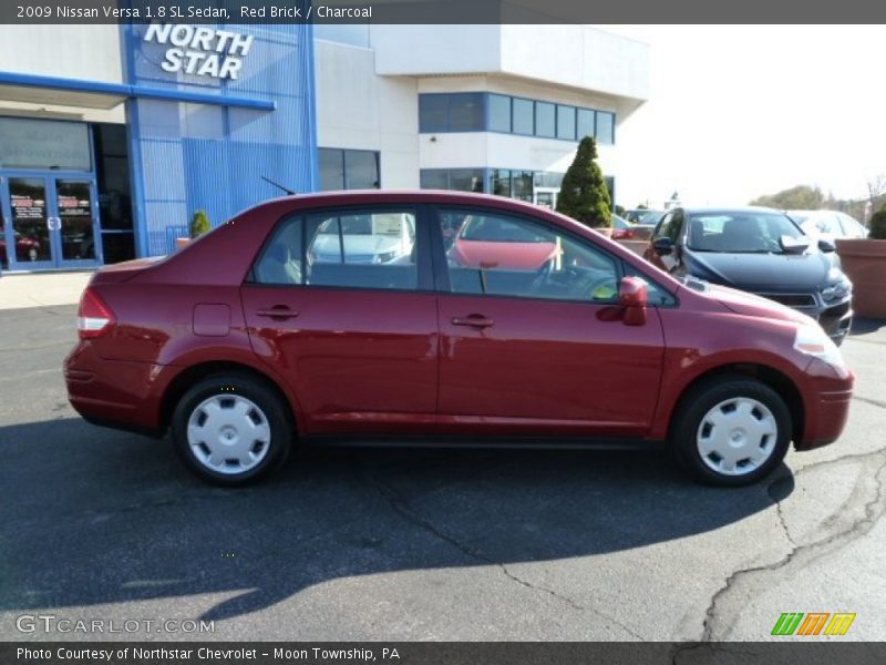 Red Brick / Charcoal 2009 Nissan Versa 1.8 SL Sedan