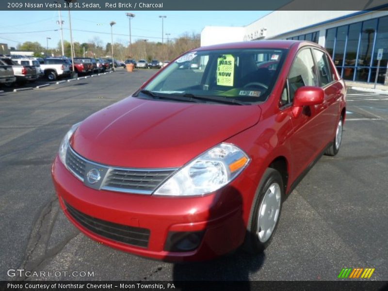 Red Brick / Charcoal 2009 Nissan Versa 1.8 SL Sedan