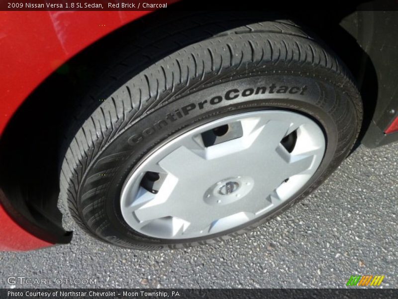 Red Brick / Charcoal 2009 Nissan Versa 1.8 SL Sedan