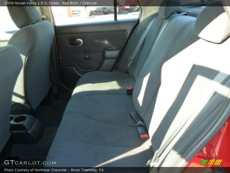 Red Brick / Charcoal 2009 Nissan Versa 1.8 SL Sedan