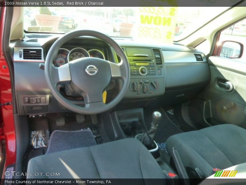 Red Brick / Charcoal 2009 Nissan Versa 1.8 SL Sedan