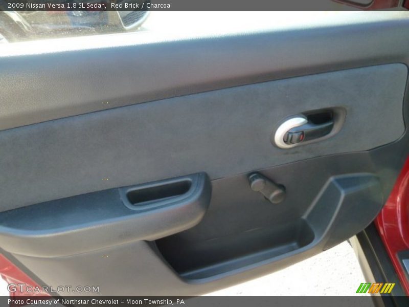 Red Brick / Charcoal 2009 Nissan Versa 1.8 SL Sedan