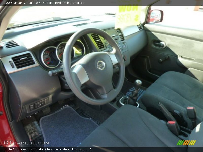Red Brick / Charcoal 2009 Nissan Versa 1.8 SL Sedan