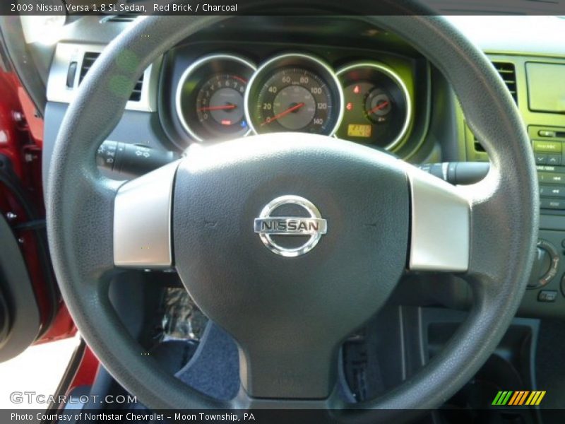 Red Brick / Charcoal 2009 Nissan Versa 1.8 SL Sedan