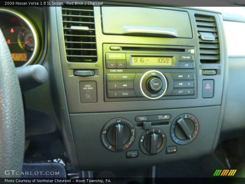 Red Brick / Charcoal 2009 Nissan Versa 1.8 SL Sedan