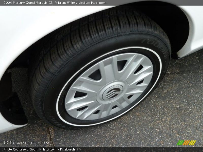 Vibrant White / Medium Parchment 2004 Mercury Grand Marquis GS