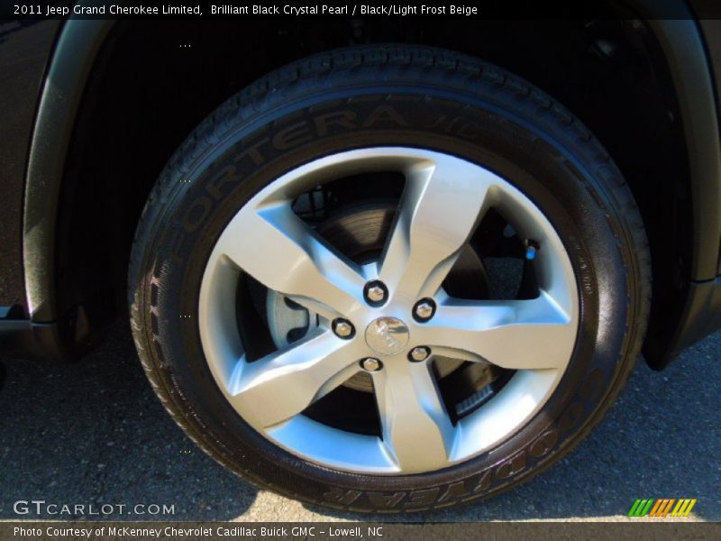 Brilliant Black Crystal Pearl / Black/Light Frost Beige 2011 Jeep Grand Cherokee Limited