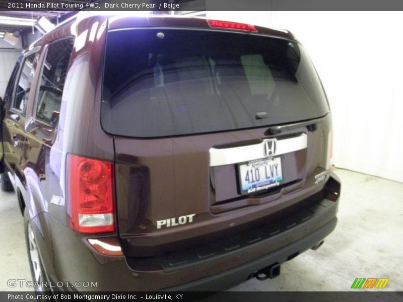 Dark Cherry Pearl / Beige 2011 Honda Pilot Touring 4WD